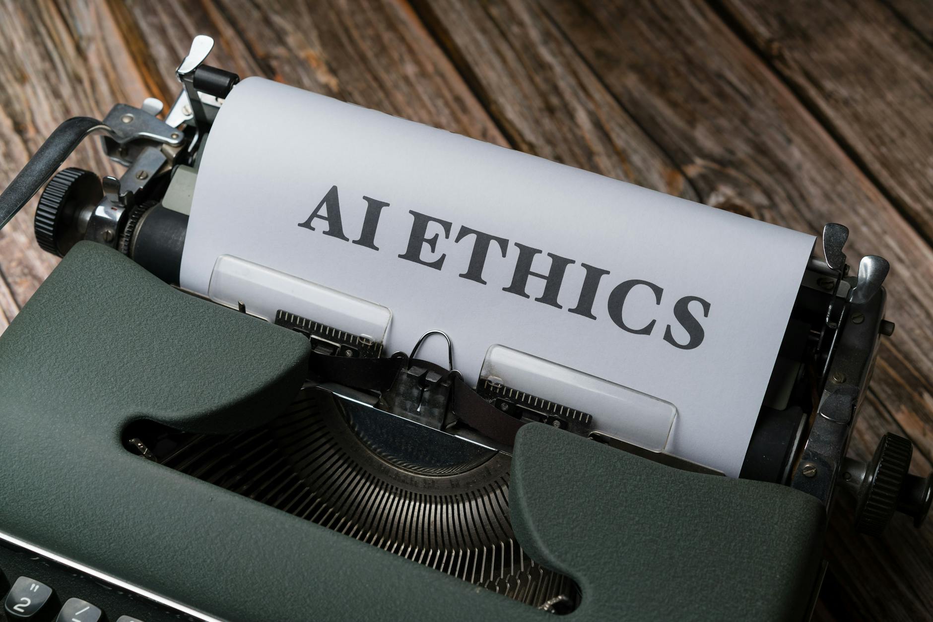 a typewriter with the word ethics on it